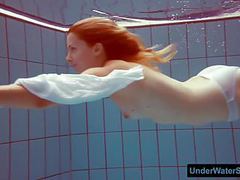 Lingerie Mania presents: Redhead in a white dress and sexy bikini