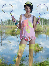 Lingerie Mania presents: Stunning skinny teen plays around with her body on the lap of nature with the blue sky complimenting her beauty.