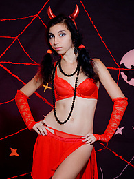 Lingerie Mania presents: Only one look in the eyes of this fantastic slim teen will tell that she is a little devil inside. No further costume is needed.