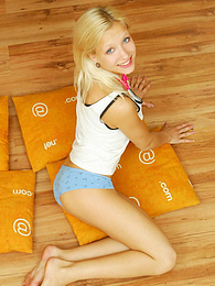 Lingerie Mania presents: Amazing blonde nude teen decided to place herself at the attic of her wooden house on four orange pillows for her dirty intention.